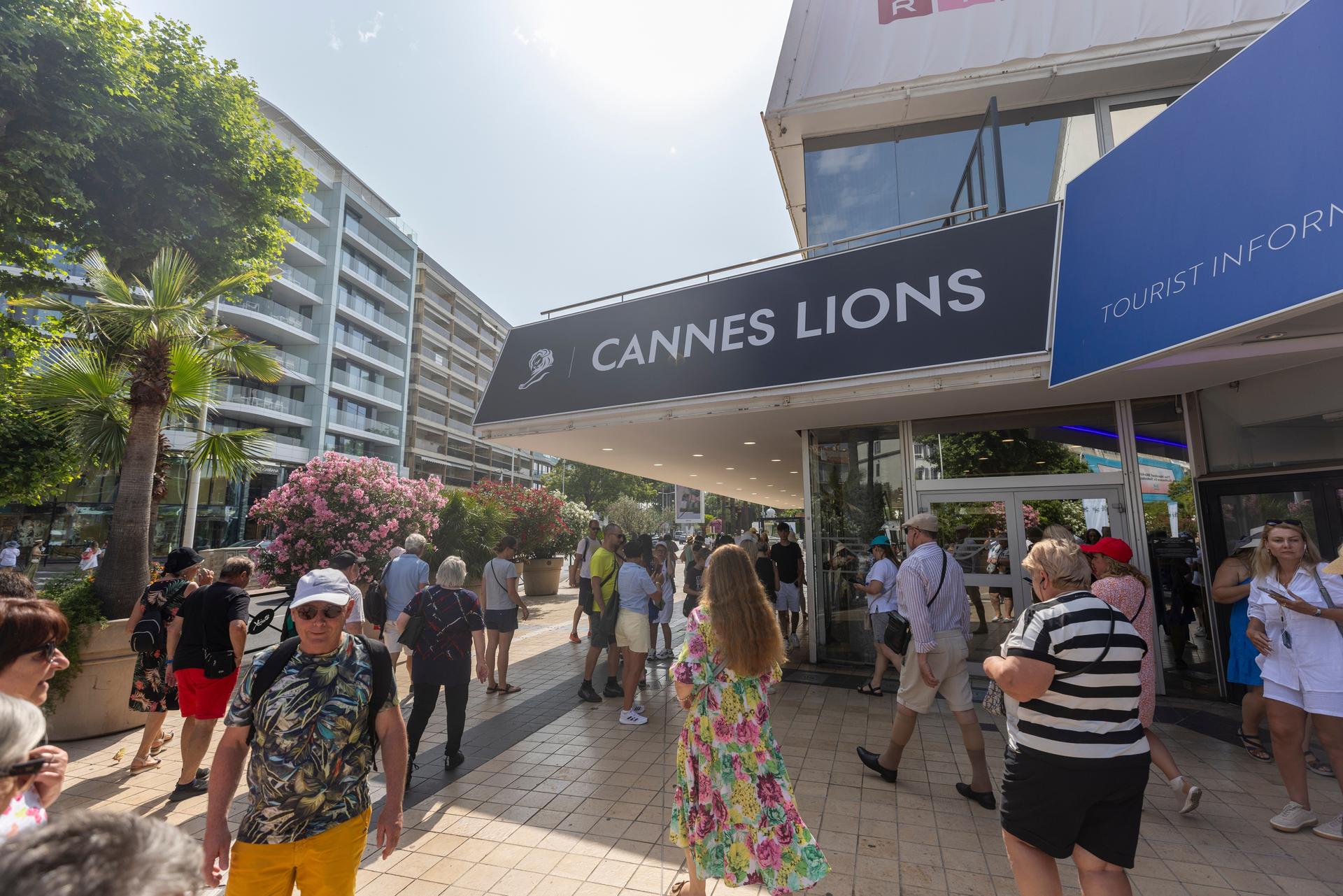 Outdoor scene at Cannes Lions 2026 showing people at a festival celebrating AI in marketing.