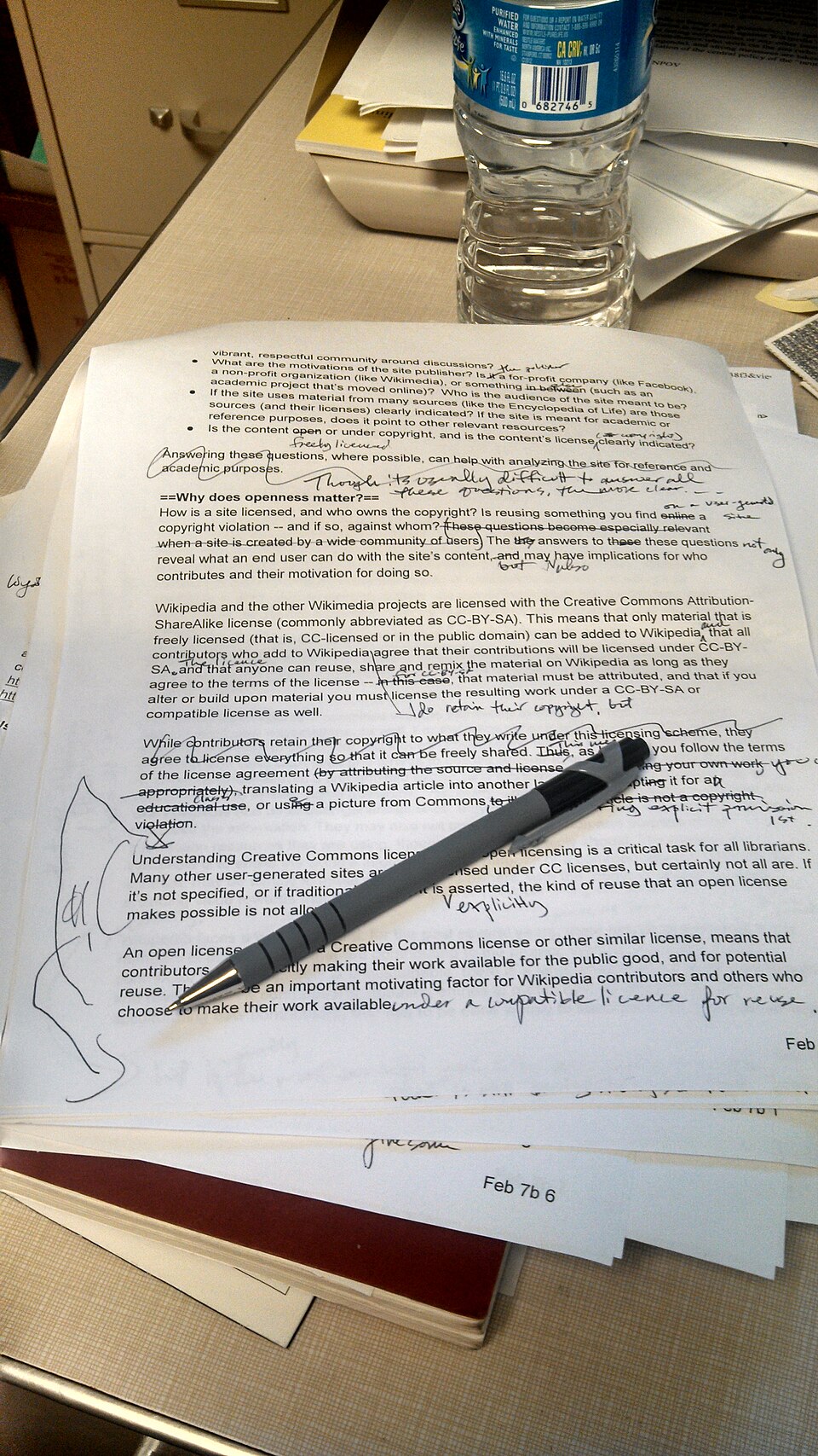 Printed manuscript with handwritten corrections, crossed-out text, and editorial notes.