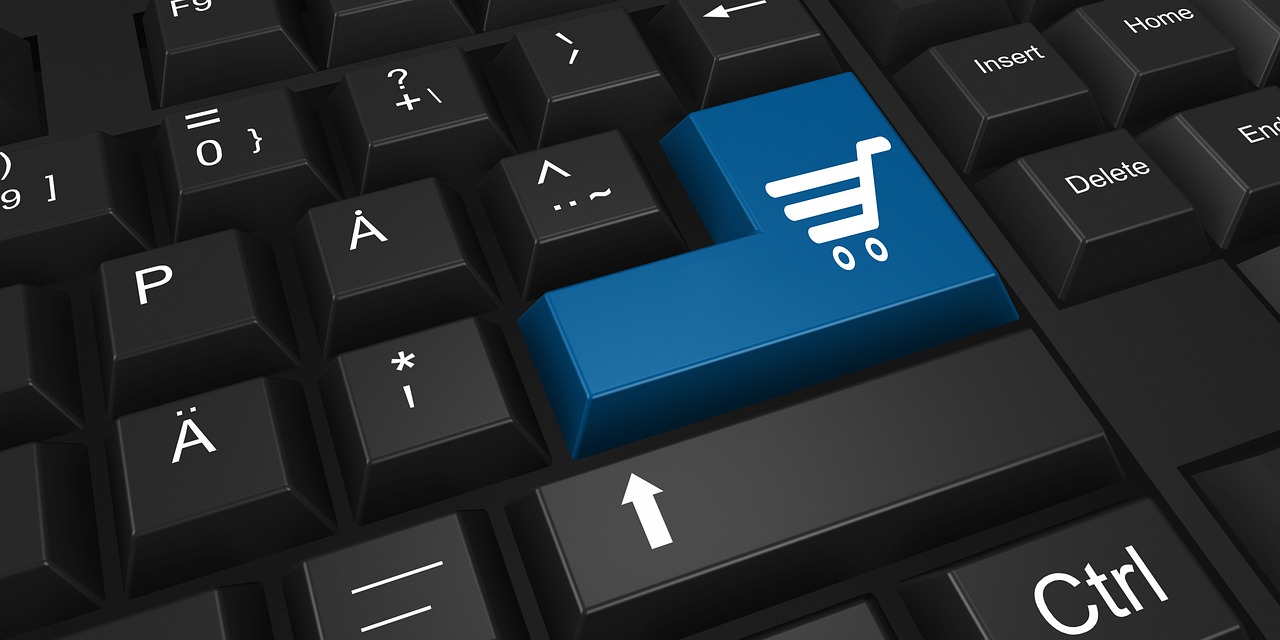 Shopping cart keyboard key representing online purchases influenced by AI advertising and disclosure timing