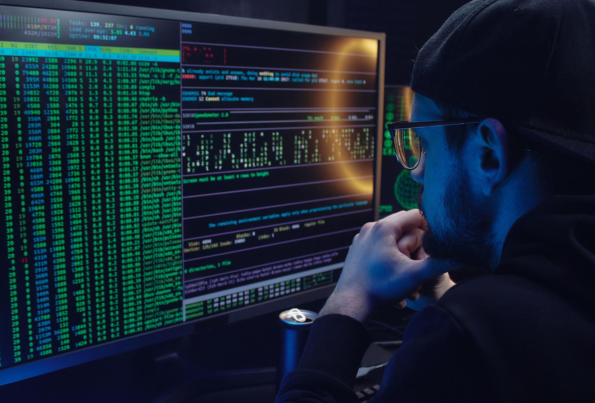 Analyst examines AI-generated code patterns to identify zero-day vulnerabilities in security breach investigation.