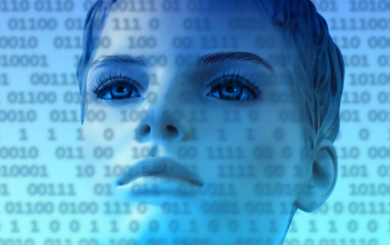 Futuristic humanoid face surrounded by binary code, representing AI-assisted search and changing query habits