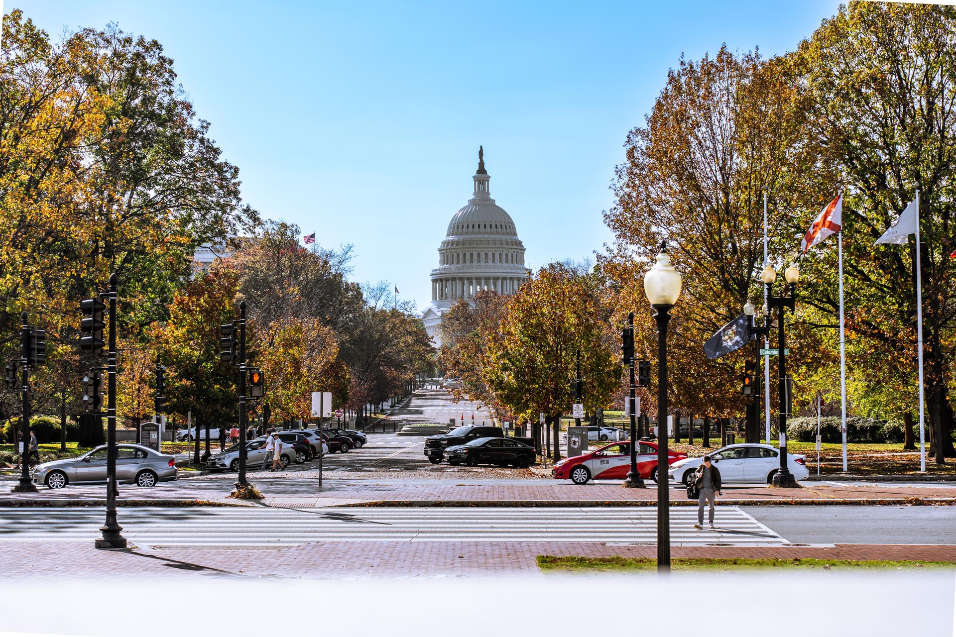 U.S. Capitol Building Site of AI Safety Accord Cars parked near the U.S. Capitol, a backdrop for the AI safety cooperation signed by tech leaders.