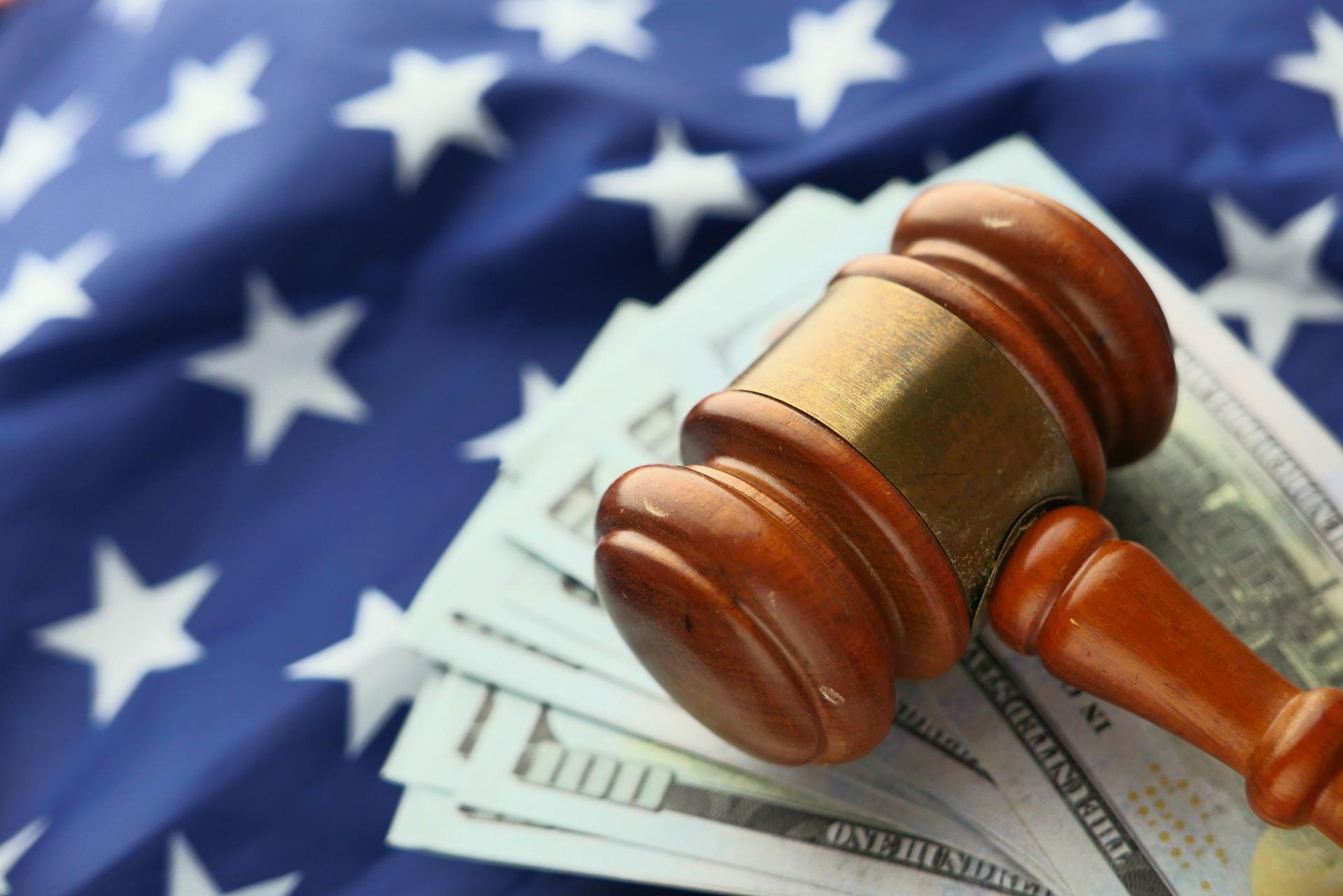 A gavel symbolizing justice amid financial stakes in antitrust case over AI collusion.