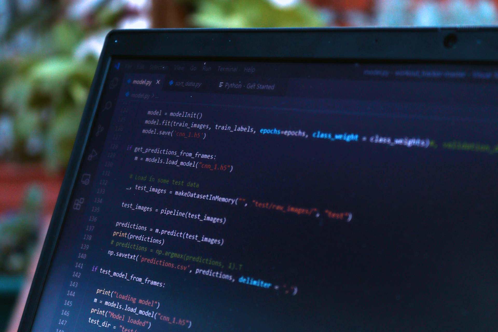 Close-up of laptop screen with Python code for AI agents modeling tasks
