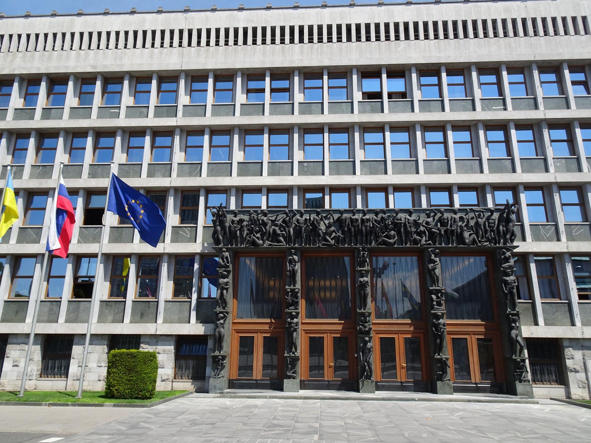 Facade of the Slovenian Parliament building, symbolizing EU regulatory actions against tech giants like Google.