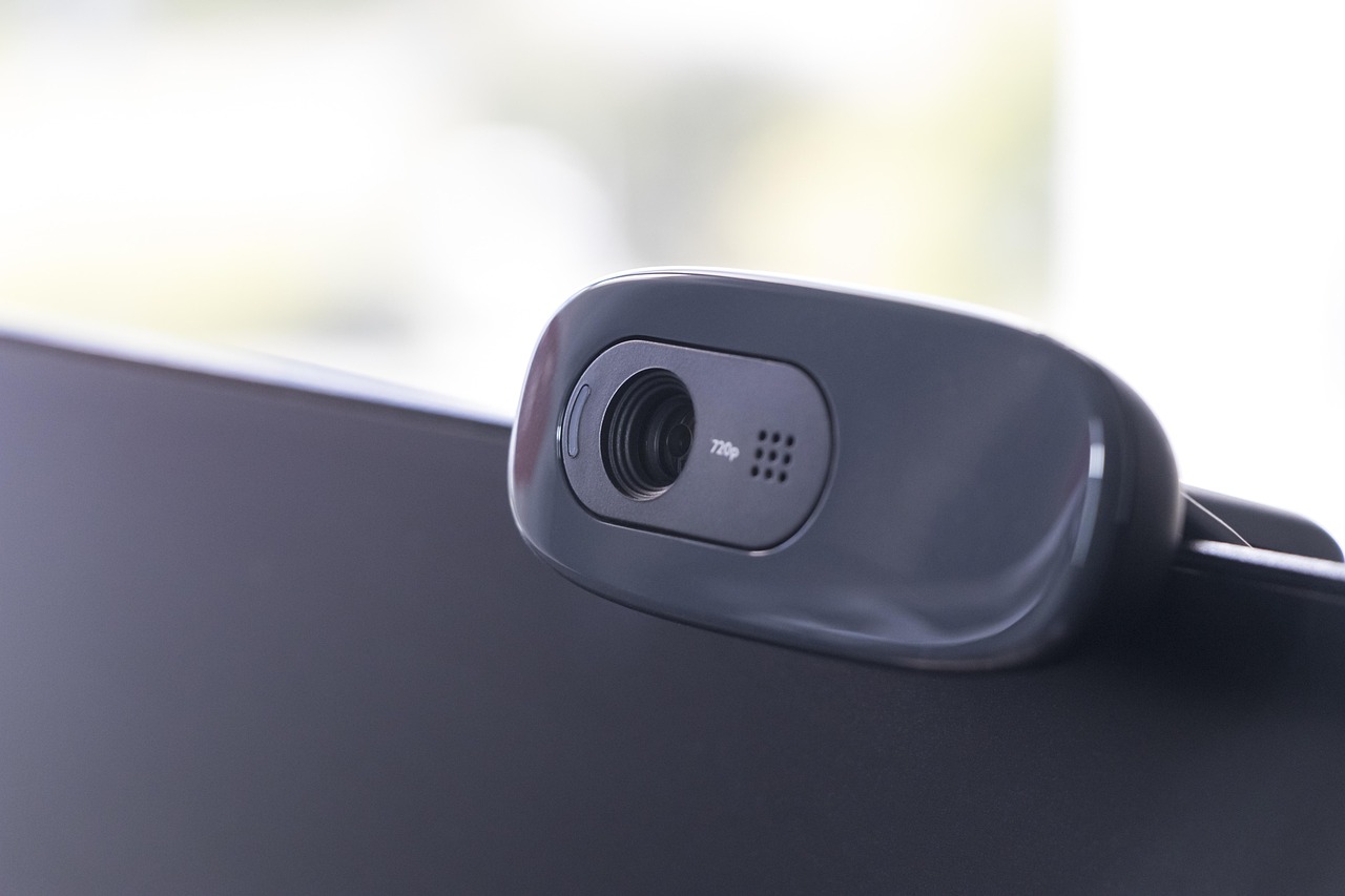Webcam on a monitor for Teams meetings with deepfake security detection